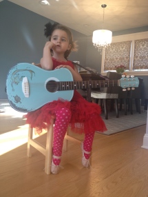 Natalie has recently had a bad month…this photo was taken on her first GREAT day. Seeing her wear her everyday red dress and break out her guitar meant EVERYTHING to me.